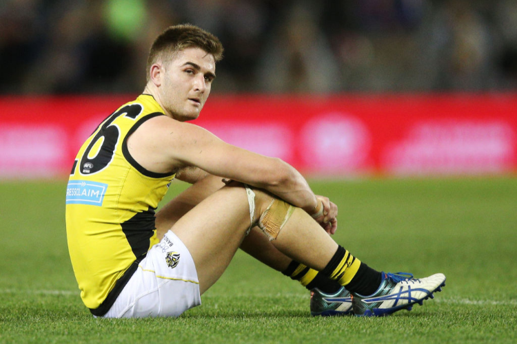ANTHONY MILES of the Tigers looks dejected after losing during the VFL Grand Final match between Richmond and Port Melbourne at Etihad Stadium in Melbourne, Australia.