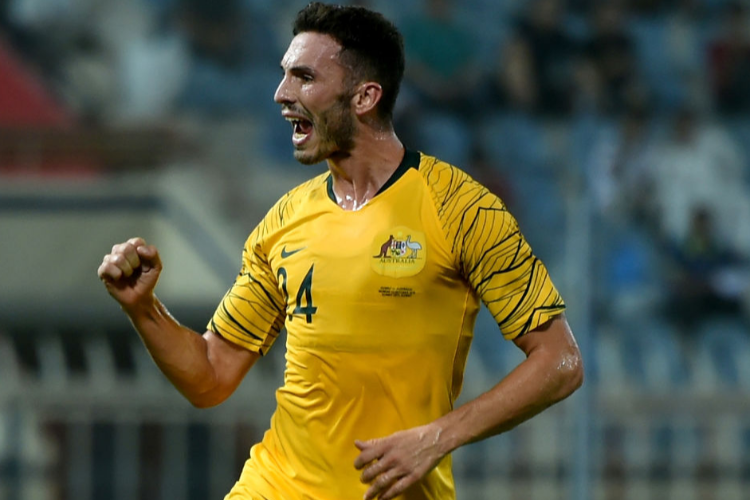 APOSTOLOS GIANNOU of Australia celebrates scoring the opening goal during the International Friendly match between Kuwait and Australia at Al Kuwait Sports Club Stadium in Kuwait City, Kuwait. APOSTOLOS GIANNOU of Australia celebrates scoring the opening goal during the International Friendly match between Kuwait and Australia at Al Kuwait Sports Club Stadium in Kuwait City, Kuwait.