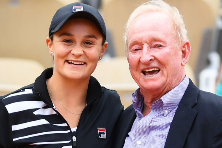ASHLEIGH BARTY of Australia celebrates victory with former Australian Tennis player ROD LAVER during the French Open at Roland Garros in Paris, France.