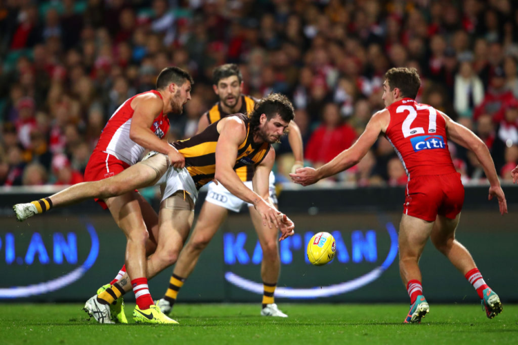 BEN STRATTON Ben of the Hawks is tackled during the AFL match between the Sydney Swans and the Hawthorn Hawks at SCG in Sydney, Australia. BEN STRATTON Ben of the Hawks is tackled during the AFL match between the Sydney Swans and the Hawthorn Hawks at SCG in Sydney, Australia.
