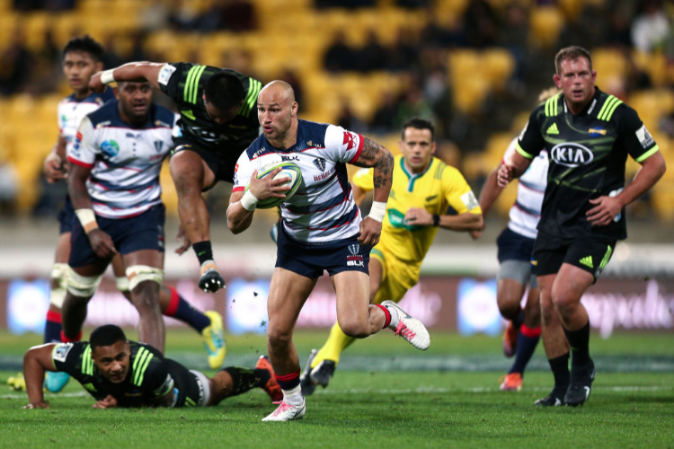 BILLY MEAKES of the Rebels makes a break during the round 12 Super Rugby match between the Hurricanes and Rebels at Westpac Stadium in Wellington, New Zealand.