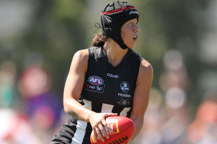 BRITTANY BONNICI of the Magpies runs with the ball during the AFL Women's match between the Collingwood Magpies and the Greater Western Sydney Giants at Olympic Park in Melbourne, Australia. BRITTANY BONNICI of the Magpies runs with the ball during the AFL Women's match between the Collingwood Magpies and the Greater Western Sydney Giants at Olympic Park in Melbourne, Australia.