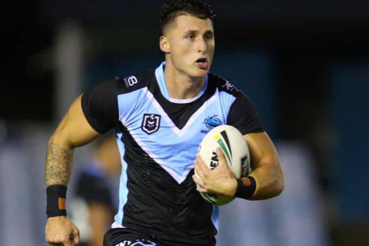 BRONSON XERRI of the Sharks runs the ball during the NRL Trial match between the Cronulla Sharks and the Manly Sea Eagles at Shark Park in Sydney, Australia.