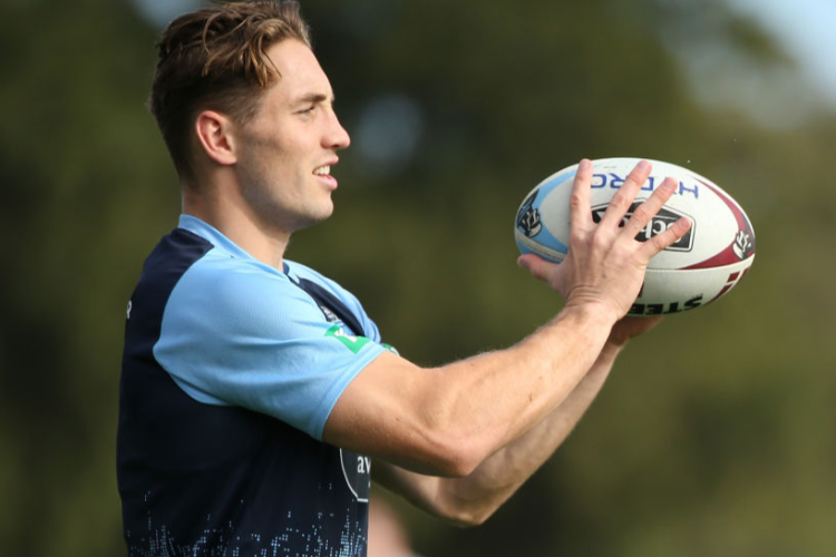 CAMERON MURRAY looks on while warming up during a New South Wales Blues State of Origin media opportunity at Hale School in Perth, Australia.