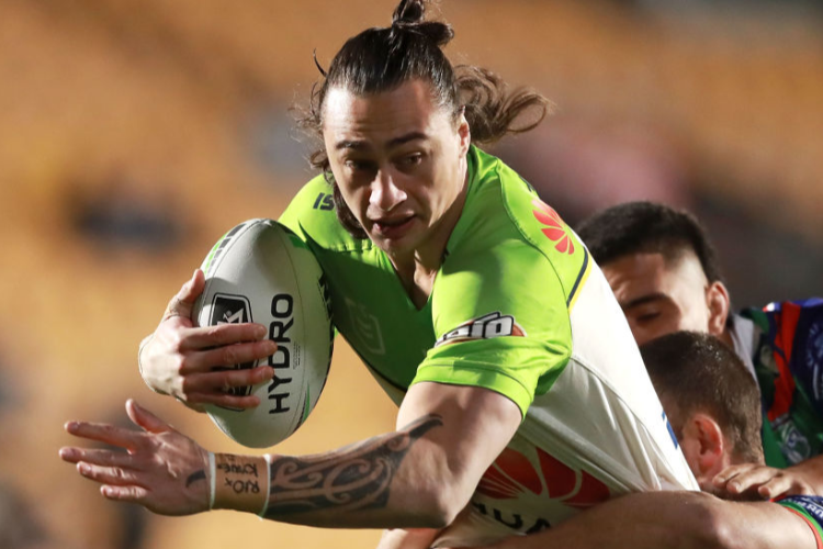 CHARNZE NICOLL-KLOKSTAD of the Raiders is tackled during the NRL match between the New Zealand Warriors and the Canberra Raiders at Mt Smart Stadium in Auckland, New Zealand.