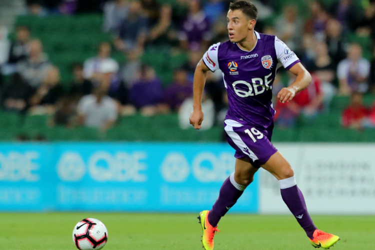 CHRIS IKONOMIDIS of Perth Glory looks on for a player to pass to during the A-League match between the Perth Glory and the Brisbane Roar at nib Stadium in Perth, Australia.