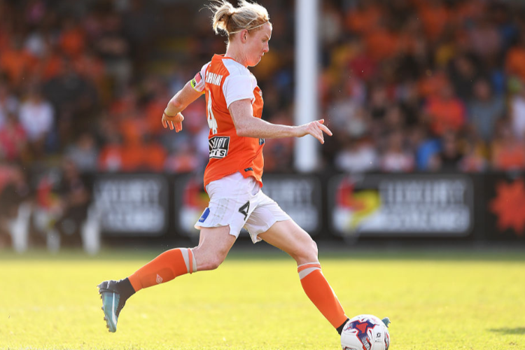CLARE POLKINGHORNE of the Roar dribbles the ball during the W-League Semi Final match between the Brisbane Roar and Melbourne City at Perry Park in Brisbane, Australia.