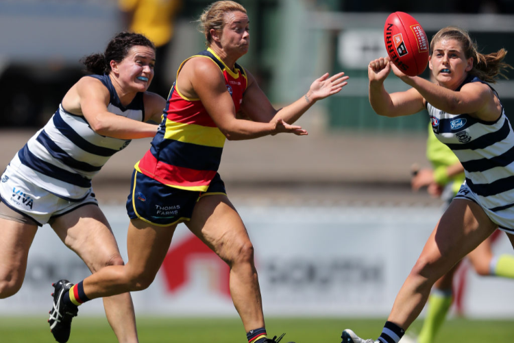 AFLW players in action.