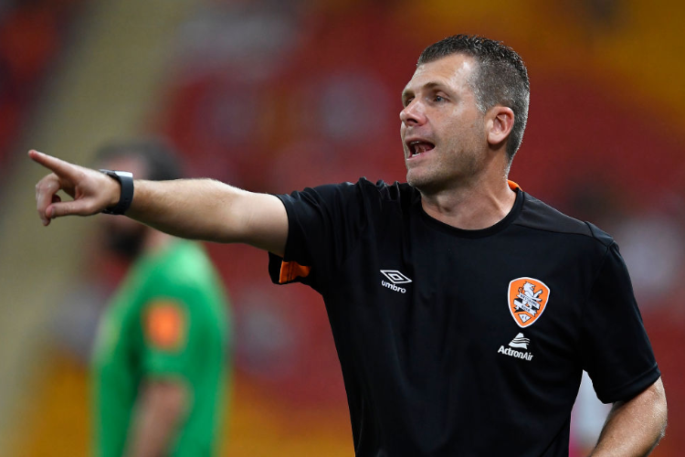 Roar coach DARREN DAVIES gestures during the A-League match between the Brisbane Roar and the Western Sydney Wanderers at Suncorp Stadium in Brisbane, Australia. Roar coach DARREN DAVIES gestures during the A-League match between the Brisbane Roar and the Western Sydney Wanderers at Suncorp Stadium in Brisbane, Australia.
