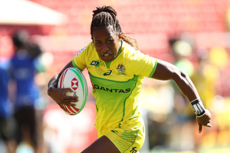 ELLIA GREEN of Australia runs the ball in the Women's Cup Semi Final 2 played between Australia and Ireland during the Sydney HSBC Sevens at Spotless Stadium in Sydney, Australia.