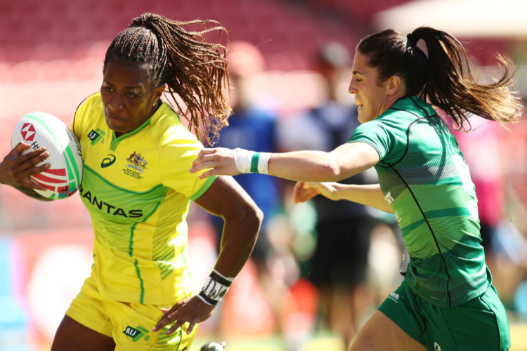 ELLIA GREEN of Australia runs the ball in the Women's Cup Semi Final 2 played between Australia and Ireland during the Sydney HSBC Sevens at Spotless Stadium in Sydney, Australia.