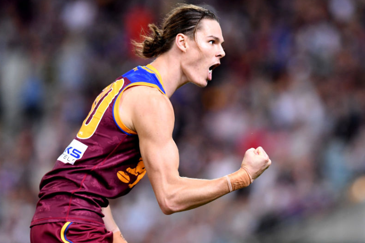 ERIC HIPWOOD of the Lions celebrates kicking a goal during the AFL match between Brisbane and Collingwood at The Gabba in Brisbane, Australia.