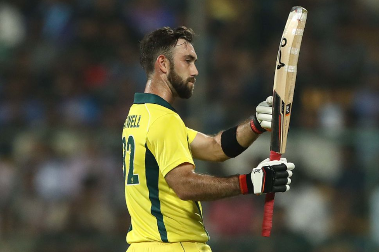 GLENN MAXWELL of Australia celebrates scoring his fifty runs during game of the T20I Series between India and Australia at M. Chinnaswamy Stadium on in Bangalore, India.