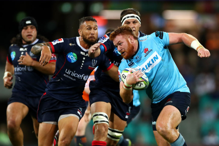 HARRY JOHNSON-HOLMES of the Waratahs runs the ball during the round 10 Super Rugby match between the Waratahs and the Melbourne Rebels at the Sydney Cricket Ground in Sydney, Australia.
