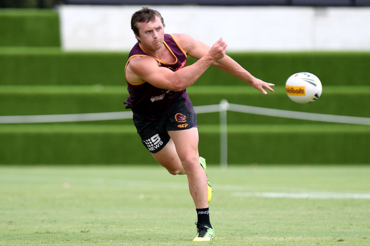 JAKE TURPIN passes the ball during the Brisbane Broncos NRL training session in Brisbane, Australia.