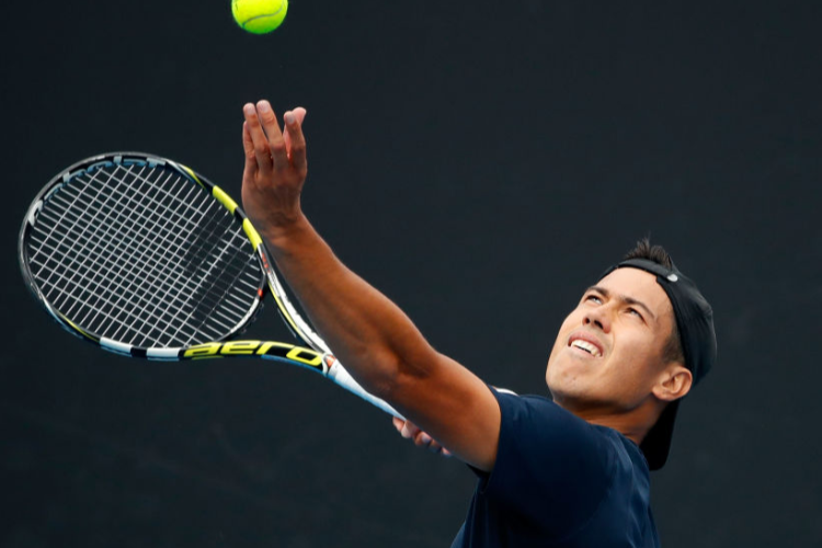 JASON KUBLER of Australia serves in his first round match against Pablo Carreno Busta of Spain on day one of the 2018 Australian Open at Melbourne Park in Melbourne, Australia.