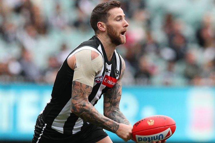 JEREMY HOWE of the Magpies in action during the AFL match between the Collingwood Magpies and the Gold Coast Suns at MCG in Melbourne, Australia.