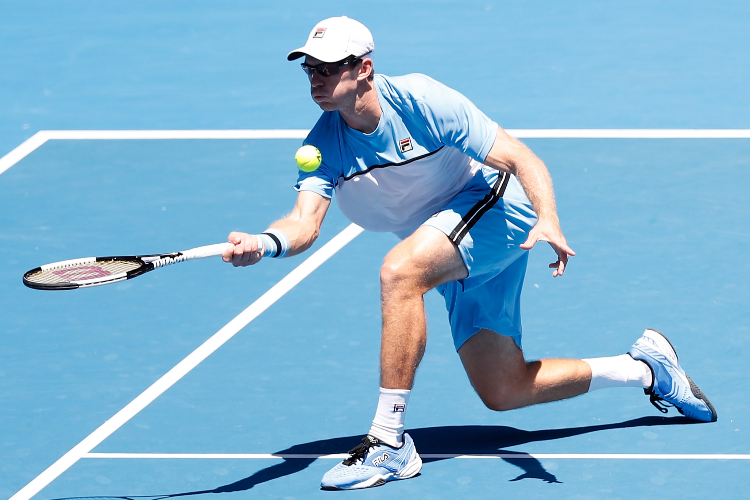 JOHN PEERS of Australia plays a forehand during the Australian Open at Melbourne Park, Melbourne, Australia.