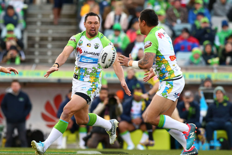 JORDAN RAPANA of the Raiders offloads during the NRL match between the Canberra Raiders and the Sydney Roosters at GIO Stadium in Canberra, Australia.