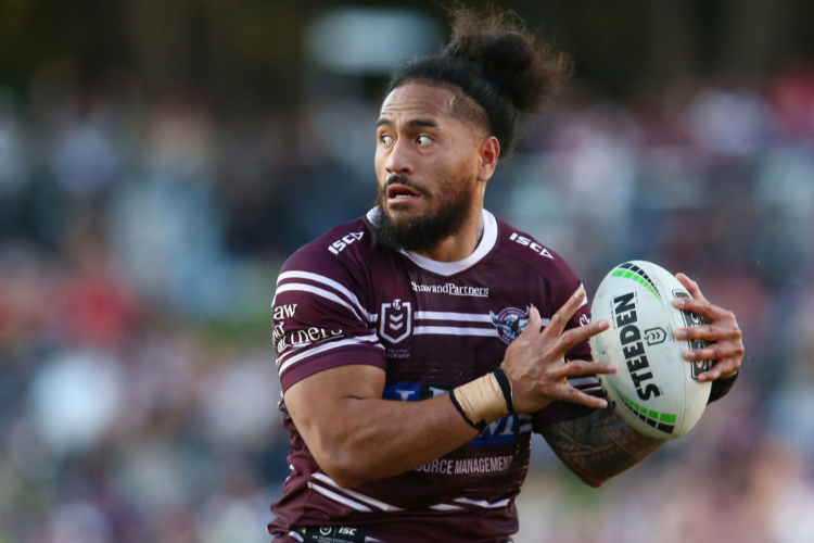 JORGE TAUFUA of the Sea Eagles looks to pass during the NRL match between the Manly Sea Eagles and the Newcastle Knights at Lottoland in Sydney, Australia.