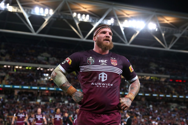 JOSH MCGUIRE of Queensland leaves the field at half-time during the State of Origin series between the Queensland Maroons and the New South Wales Blues at Suncorp Stadium in Brisbane, Australia.