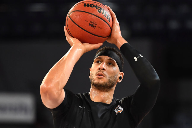 JOSH BOONE of Melbourne United warms up before the start of the NBL match between the Cairns Taipans and Melbourne United at the Cairns Convention Centre in Cairns, Australia. JOSH BOONE of Melbourne United warms up before the start of the NBL match between the Cairns Taipans and Melbourne United at the Cairns Convention Centre in Cairns, Australia.