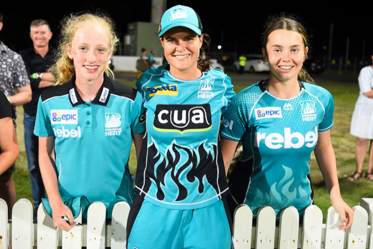 JOSIE DOOLEY of the Heat poses with Heat fans at the end of the Womens Big Bash League match between the Brisbane Heat and the Adelaide Strikers at Harrup Park in Mackay, Australia. JOSIE DOOLEY of the Heat poses with Heat fans at the end of the Womens Big Bash League match between the Brisbane Heat and the Adelaide Strikers at Harrup Park in Mackay, Australia.