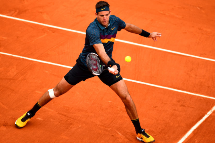 JUAN MARTIN DEL POTRO of Argentina volleys during the French Open at Roland Garros in Paris, France.