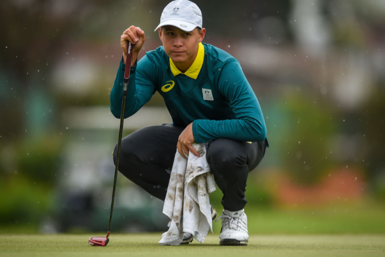 KARL VILIPS of Australia lines up a putt on the 18th green during Buenos Aires Youth Olympic Games at Hurlingham Club in Buenos Aires, Argentina.