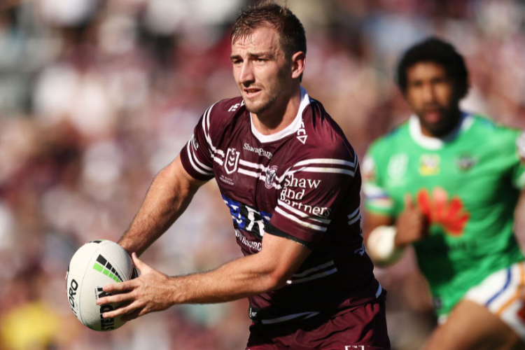 LACHLAN CROKER of the Sea Eagles runs with the ball during the NRL match between the Manly Warringah Sea Eagles and the Canberra Raiders at Lottoland in Sydney, Australia.