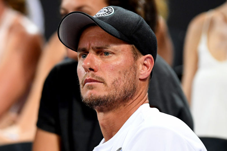 LLEYTON HEWITT watches on during the Brisbane International at Pat Rafter Arena in Brisbane, Australia.