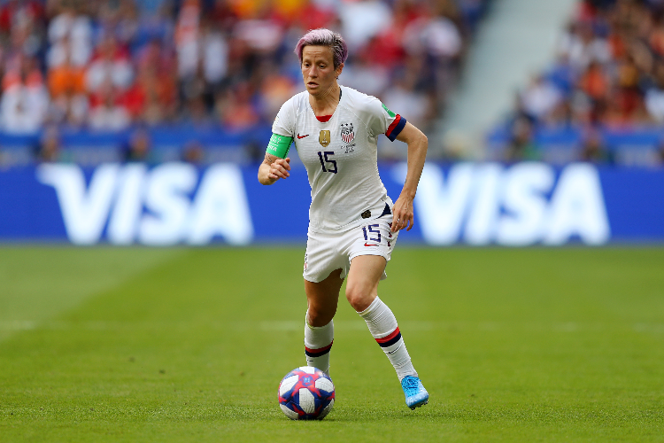 MEGAN RAPINOE of the USA runs with the ball during the 2019 FIFA Women's World Cup France Final match between The United States of America and The Netherlands at Stade de Lyon in Lyon, France.