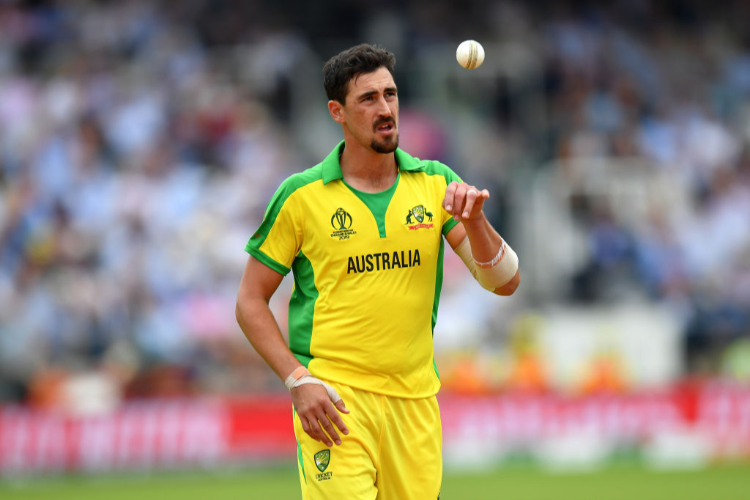 MITCHELL STARC of Australia prepares to bowl during the ICC Cricket World Cup between England and Australia at Lords in London, England.