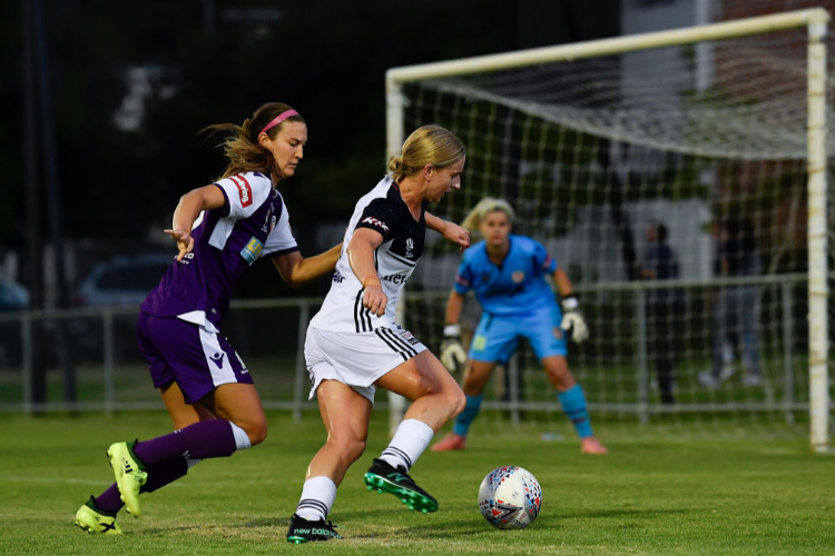 NATASHA DOWIE of the Victory controls the ball during the round 14 W-League match between the Perth Glory and the Melbourne Victory at Dorrien Gardens in Perth, Australia. NATASHA DOWIE of the Victory controls the ball during the round 14 W-League match between the Perth Glory and the Melbourne Victory at Dorrien Gardens in Perth, Australia.