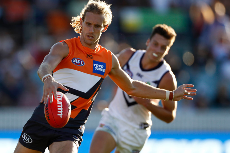 NICK HAYNES of the Giants looks upfield during the match between the Greater Western Sydney Giants and Fremantle Dockers at UNSW Canberra Oval in Canberra, Australia.