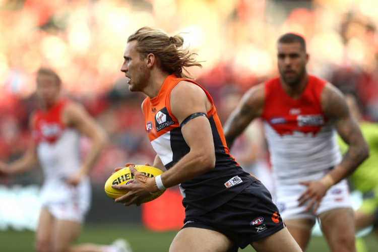 NICK HAYNES of the Giants looks upfield during the AFL match between the Greater Western Sydney Giants and the Sydney Swans at Spotless Stadium in Sydney, Australia.