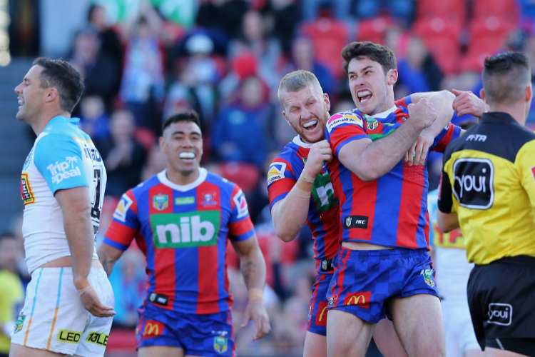 NICK MEANEY of the Knights celebrates his try with team mates during the round 19 NRL match between the Newcastle Knights and the Gold Coast Titans at McDonald Jones Stadium in Newcastle, Australia. NICK MEANEY of the Knights celebrates his try with team mates during the round 19 NRL match between the Newcastle Knights and the Gold Coast Titans at McDonald Jones Stadium in Newcastle, Australia.
