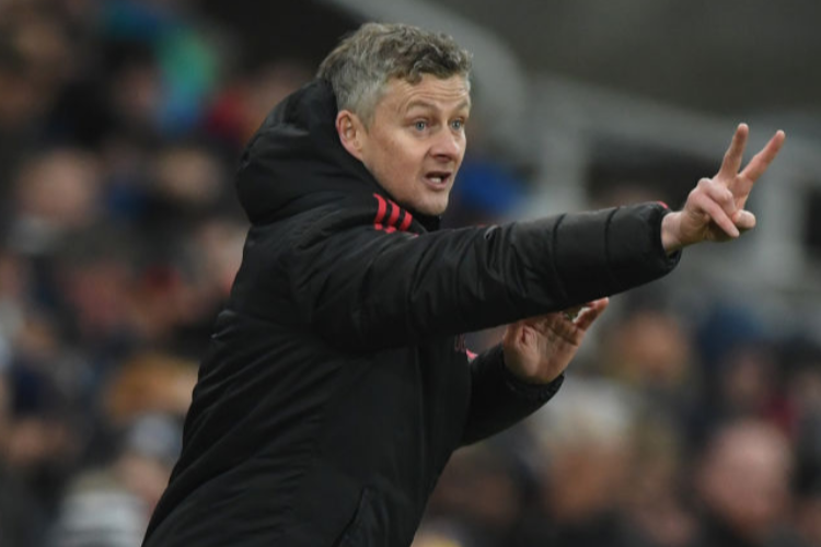 OLE GUNNAR SOLSKJAER, Interim Manager of Manchester United gives his team instructions during the Premier League match between Newcastle United and Manchester United at St. James Park in Newcastle upon Tyne, United Kingdom.
