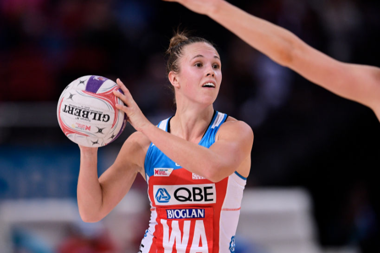 PAIGE HADLEY of the Swifts looks to pass the ball during the Super Netball match between the Swifts and the Lightning at Qudos Bank Arena in Sydney, Australia. PAIGE HADLEY of the Swifts looks to pass the ball during the Super Netball match between the Swifts and the Lightning at Qudos Bank Arena in Sydney, Australia.