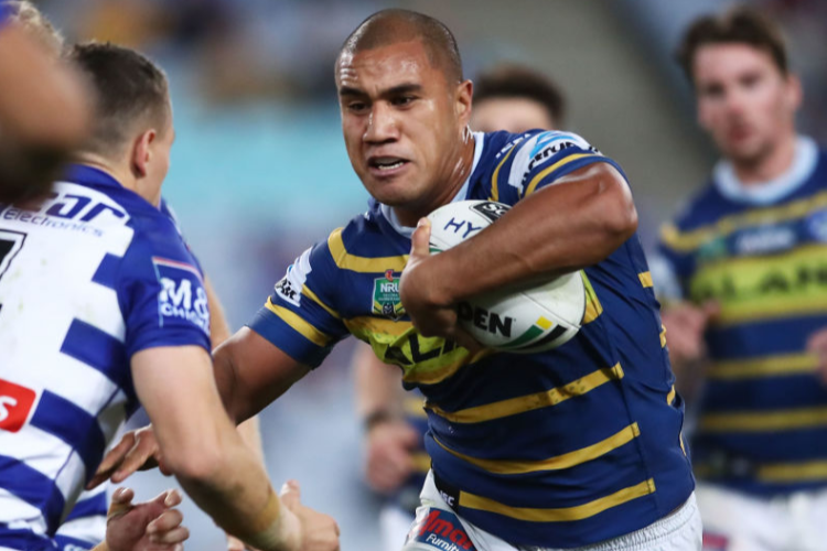 PENI TEREPO of the Eels is tackled during the NRL match between the Parramatta Eels and the Canterbury Bulldogs at ANZ Stadium in Sydney, Australia.