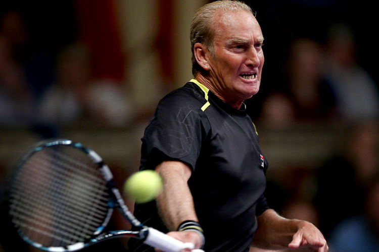 PETER MCNAMARA of Australia plays a forehand during the Mens Doubles match between Mansour Bahrami and Andrew Castle against Pat Cash and Peter McNamara on day one of the Statoil Masters Tennis at the Royal Albert Hall in London, England.