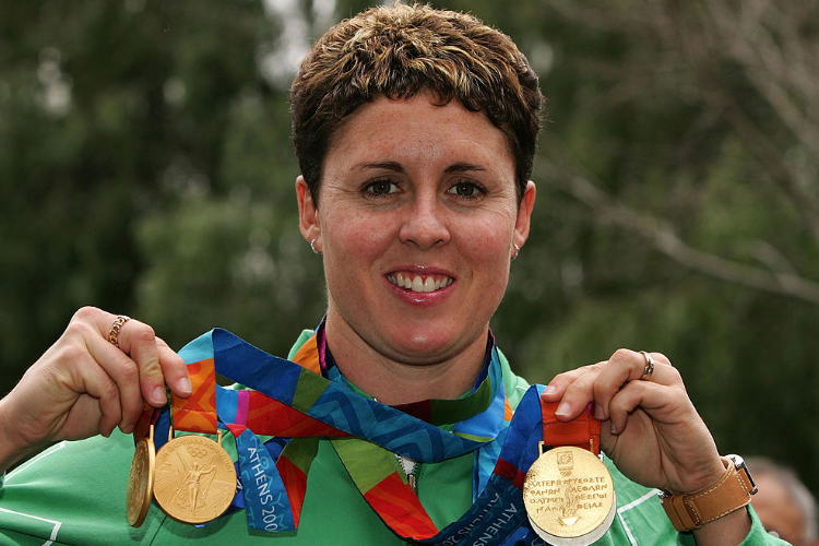 Swimmer and triple Gold Medalist PETRIA THOMAS.