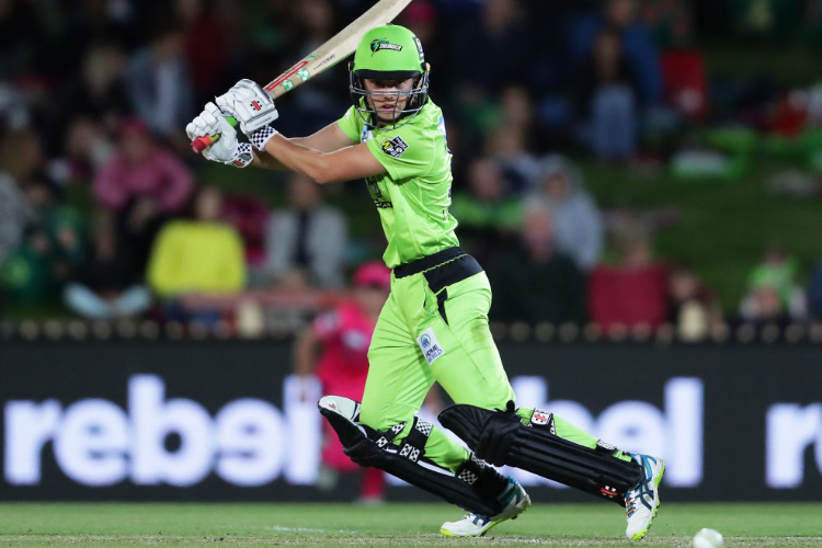 PHOEBE LITCHFIELD of the Thunder bats during the Women's Big Bash League match between the Sydney Sixers and the Sydney Thunder at North Sydney Oval in Sydney, Australia.