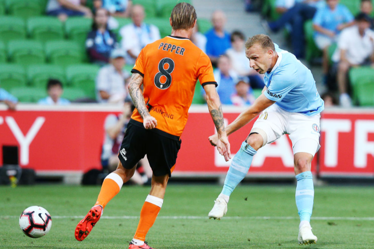 RITCHIE DE LAET of the City kicks the ball at goal during the A-League match between Melbourne City and the Brisbane Roar at AAMI Park in Melbourne, Australia.