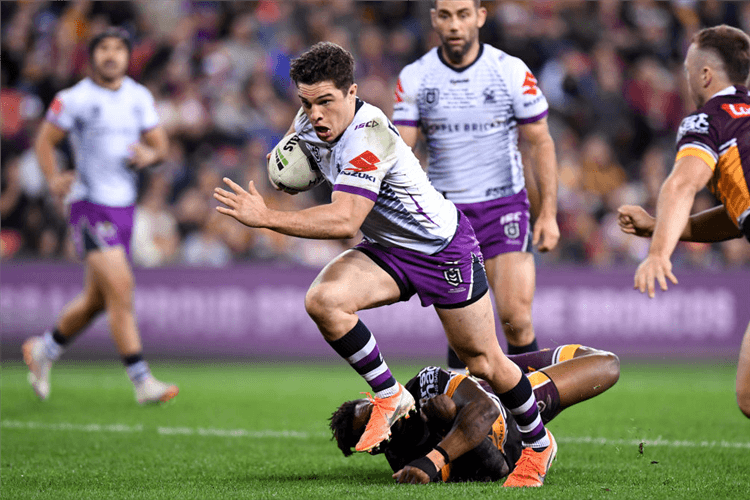 BRODIE CROFT of the Storm breaks away from the defence during the NRL match between the Brisbane Broncos and the Melbourne Storm at Suncorp Stadium in Brisbane, Australia.
