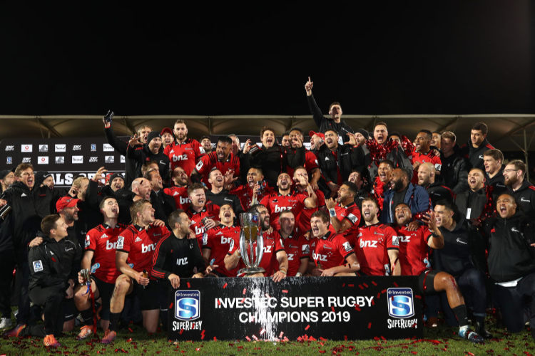 The Crusaders celebrate with the Super Rugby Trophy