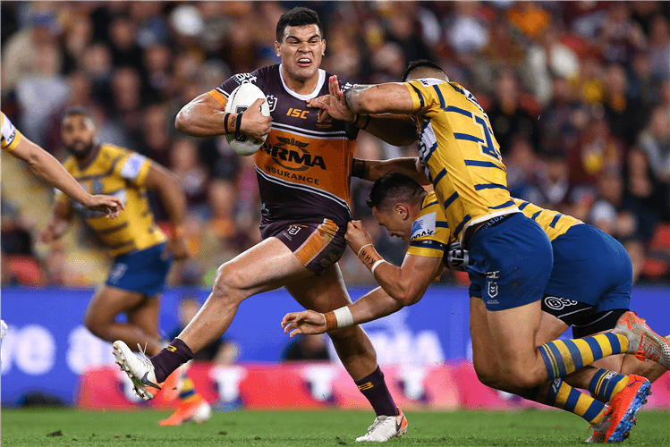 DAVID FIFITA of the Broncos breaks free from a tackle during the NRL match between the Brisbane Broncos and Parramatta Eels at Suncorp Stadium in Brisbane, Australia.