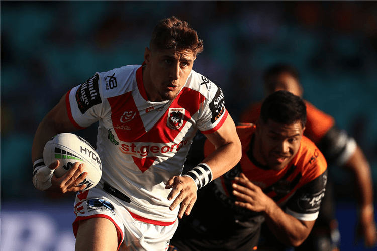 ZAC LOMAX of the Dragons makes a break during the match between the St George Illawarra Dragons and the Wests Tigers at SCG in Sydney, Australia.