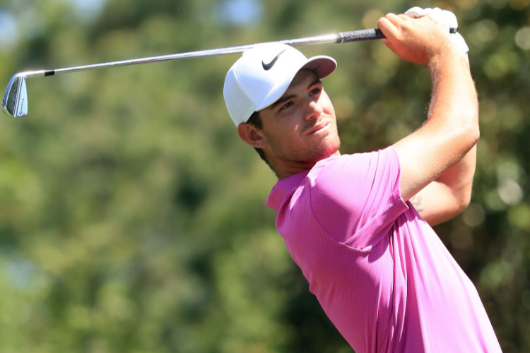 RYAN RUFFELS of Australia plays his tee shot during the Wells Fargo Championship at Quail Hollow Club in Charlotte, North Carolina.