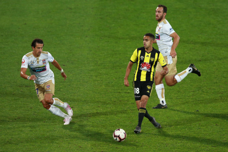 SARPREET SINGH of the Phoenix passes during the round 23 A-League match between the Wellington Phoenix and Newcastle Jets at Westpac Stadium in Wellington, New Zealand.